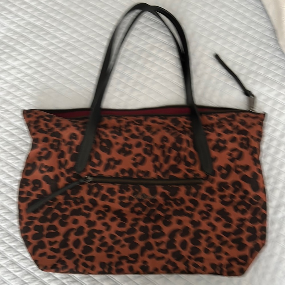Cole Haan animal print tote with black leather handles.